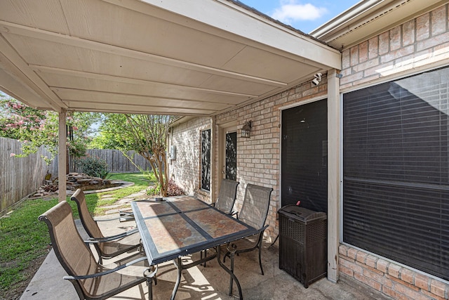 7202 N Fawn River Cir, Spring, TX 77379 - fenced backyard featuring a patio and outdoor dining space