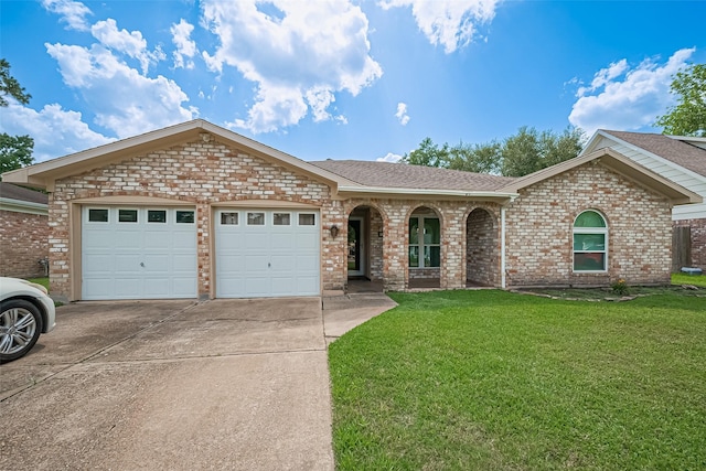 22303 Walnut Valley Dr, Spring, TX 77389 - single story home with an attached garage, a front lawn, driveway, and brick siding