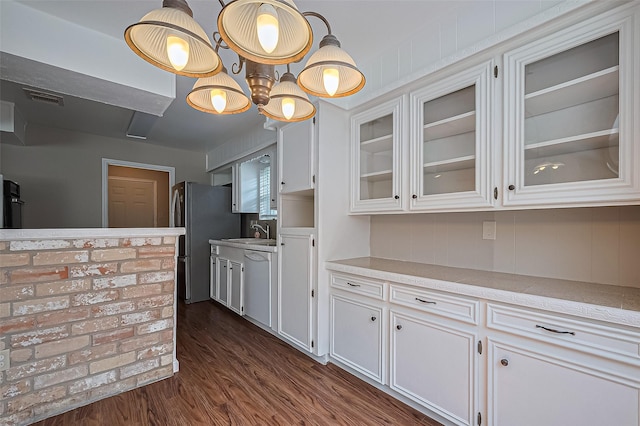 22303 Walnut Valley Dr, Spring, TX 77389 - kitchen with white cabinets, light countertops, and glass insert cabinets