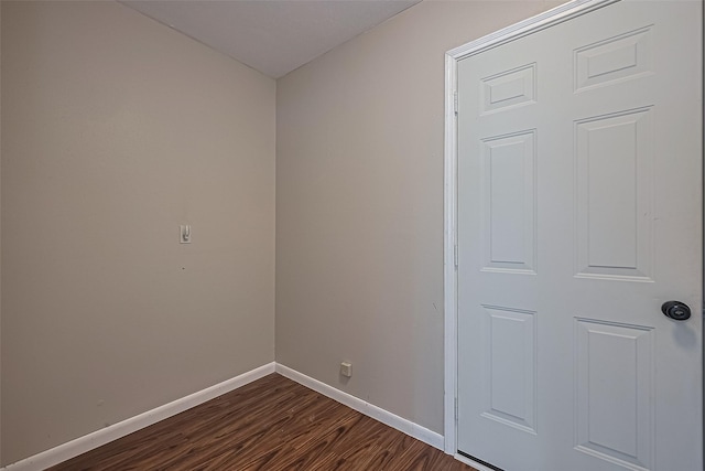 22303 Walnut Valley Dr, Spring, TX 77389 - spare room featuring dark wood-style floors and baseboards