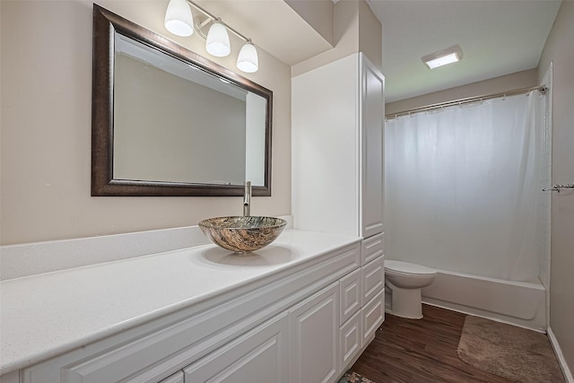 22303 Walnut Valley Dr, Spring, TX 77389 - bathroom featuring vanity, wood finished floors, and shower / bath combination with curtain