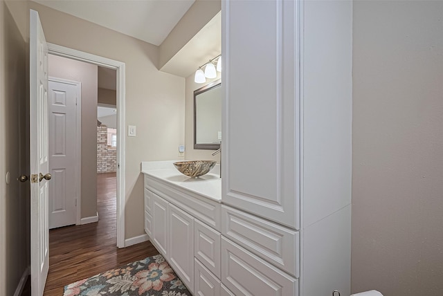 22303 Walnut Valley Dr, Spring, TX 77389 - half bath featuring vanity and wood finished floors