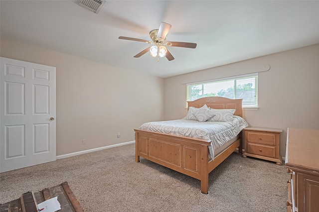 22303 Walnut Valley Dr, Spring, TX 77389 - carpeted bedroom with baseboards and a ceiling fan