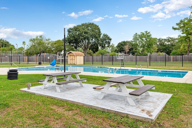 22303 Walnut Valley Dr, Spring, TX 77389 - view of swimming pool featuring a storage shed, a fenced backyard, and a patio area