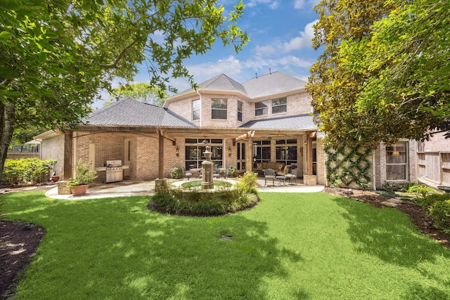 4519 Amble Oak Ct, Houston, TX 77059 - rear view of house with a patio and brick siding