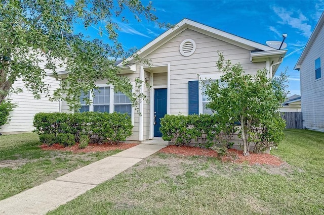 11920 Princess Garden Way, Houston, TX 77047 - view of front of property with a front lawn