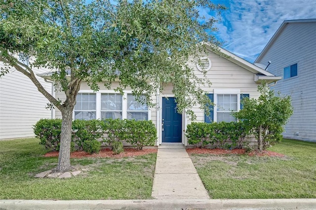 11920 Princess Garden Way, Houston, TX 77047 - view of property hidden behind natural elements with a front lawn