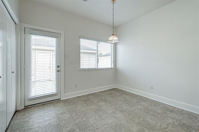 11920 Princess Garden Way, Houston, TX 77047 - unfurnished dining area featuring baseboards