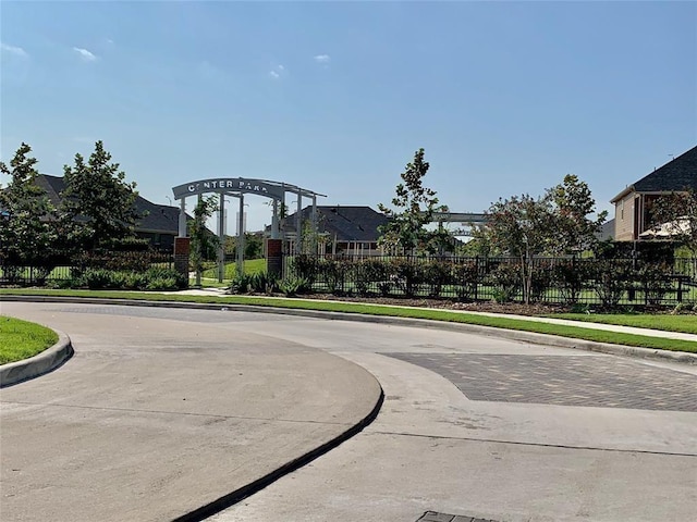 11920 Princess Garden Way, Houston, TX 77047 - view of concrete road with curbs and sidewalks