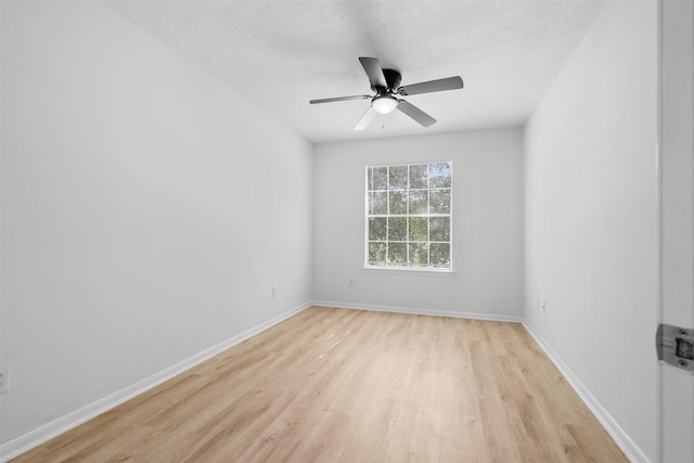 6810 Strathmore Place Ct, Katy, TX 77449 - empty room featuring light wood-style flooring and a ceiling fan