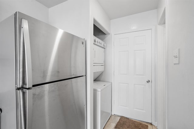 6810 Strathmore Place Ct, Katy, TX 77449 - washroom featuring stacked washing machine and dryer
