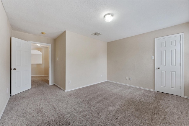 16546 Whitaker Creek Dr, Houston, TX 77095 - carpeted spare room with a textured ceiling and baseboards