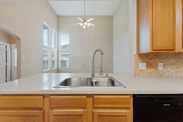 16546 Whitaker Creek Dr, Houston, TX 77095 - kitchen featuring black dishwasher, decorative backsplash, a ceiling fan, and arched walkways