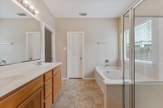 16546 Whitaker Creek Dr, Houston, TX 77095 - bathroom featuring double vanity, a garden tub, and an enclosed shower