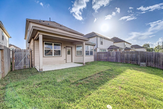 2931 Orchid Ranch Dr, Katy, TX 77494 - rear view of property with a patio area, a fenced backyard, and a gate