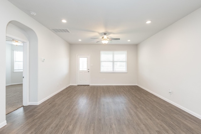 2931 Orchid Ranch Dr, Katy, TX 77494 - unfurnished room featuring a ceiling fan, arched walkways, wood finished floors, recessed lighting, and a smoke detector