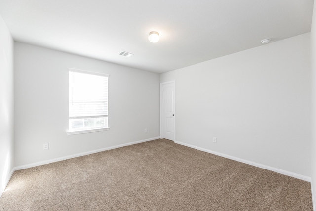 2931 Orchid Ranch Dr, Katy, TX 77494 - carpeted spare room with baseboards and a smoke detector