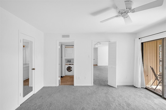 1601 S Shepherd Dr S Unit 215, Houston, TX 77019 - unfurnished bedroom with washer / clothes dryer, carpet, access to exterior, and ceiling fan