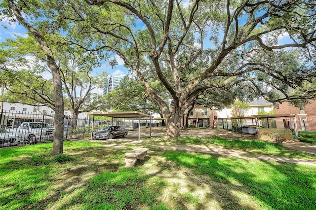 1601 S Shepherd Dr S Unit 215, Houston, TX 77019 - view of yard with a carport
