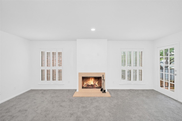 1601 S Shepherd Dr S Unit 215, Houston, TX 77019 - unfurnished living room featuring carpet, a fireplace with flush hearth, and recessed lighting