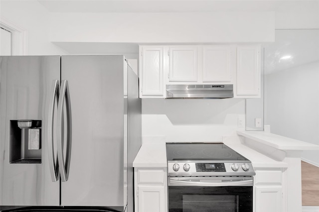 1601 S Shepherd Dr S Unit 215, Houston, TX 77019 - kitchen featuring appliances with stainless steel finishes, under cabinet range hood, light countertops, and white cabinets