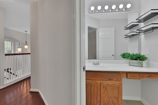 2331 Fern Bend Ln, Katy, TX 77494 - bathroom with vanity and baseboards
