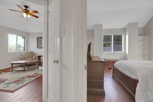 2331 Fern Bend Ln, Katy, TX 77494 - bedroom with dark wood finished floors and a ceiling fan