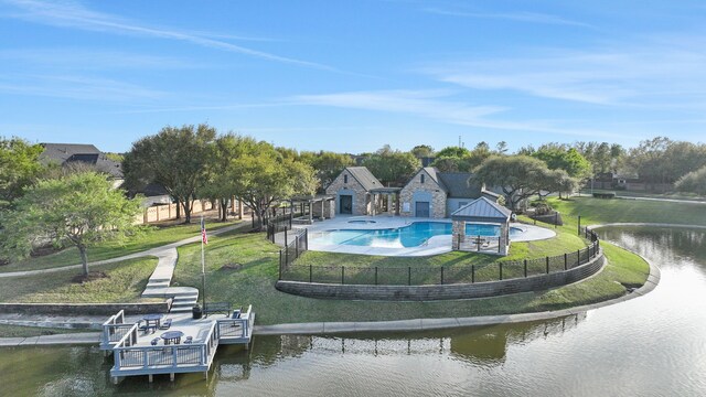 2331 Fern Bend Ln, Katy, TX 77494 - exterior space featuring a fenced backyard, a patio, and a water view