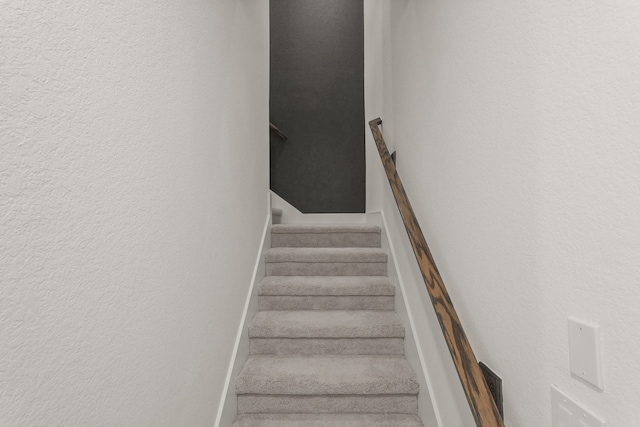 2722 Woodforest Pkwy N, Montgomery, TX 77316 - staircase with a textured wall