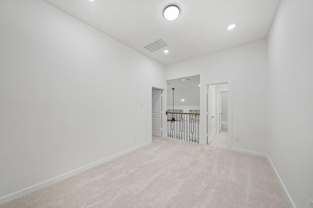 2722 Woodforest Pkwy N, Montgomery, TX 77316 - spare room with light carpet and recessed lighting