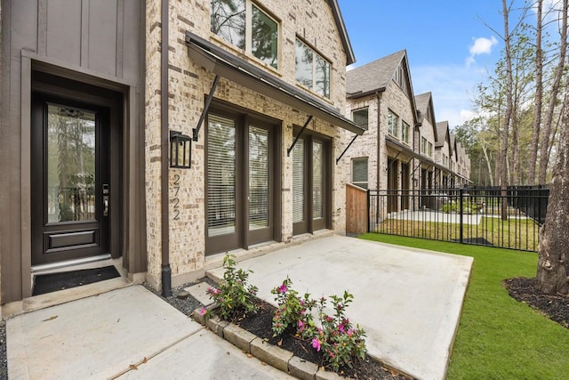 2722 Woodforest Pkwy N, Montgomery, TX 77316 - view of exterior entry featuring brick siding