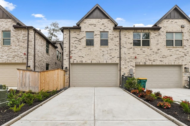 2722 Woodforest Pkwy N, Montgomery, TX 77316 - view of front of house with board and batten siding, driveway, and an attached garage