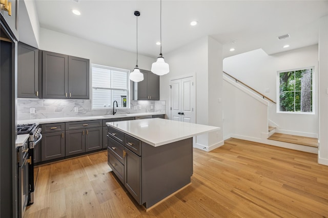 5438A Wheatley St, Houston, TX 77091 - kitchen featuring gas range, plenty of natural light, tasteful backsplash, light countertops, and recessed lighting