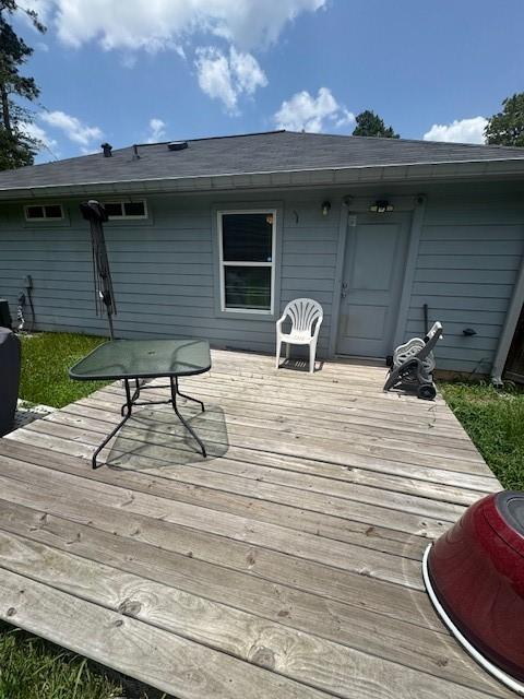 3940 Frontier Rd, Willis, TX 77378 - view of wooden deck
