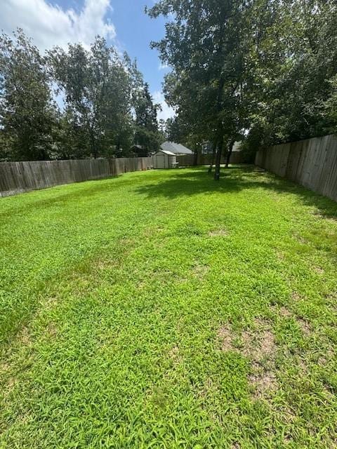 3940 Frontier Rd, Willis, TX 77378 - view of fenced backyard