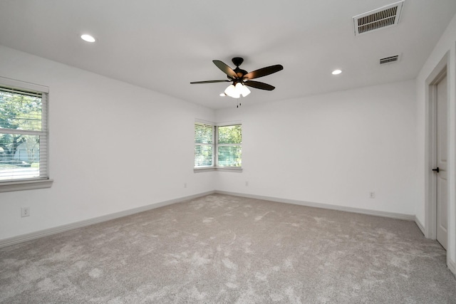 1805 E Ave, Katy, TX 77493 - carpeted empty room featuring ceiling fan and recessed lighting