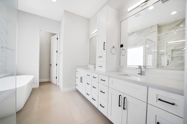 2206 Lou Ellen Ln Unit C, Houston, TX 77018 - bathroom featuring double vanity, a marble finish shower, a freestanding tub, tile patterned floors, and recessed lighting