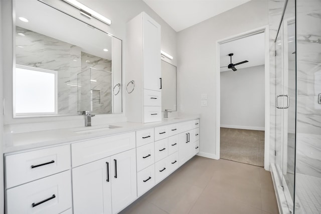 2206 Lou Ellen Ln Unit C, Houston, TX 77018 - bathroom featuring double vanity, a marble finish shower, and ceiling fan