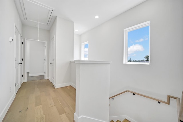 2206 Lou Ellen Ln Unit C, Houston, TX 77018 - hall featuring attic access, an upstairs landing, light wood-style floors, and recessed lighting