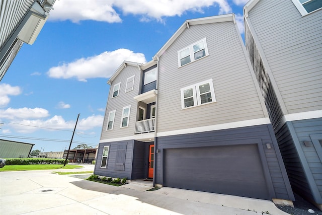 2206 Lou Ellen Ln Unit C, Houston, TX 77018 - view of front of house featuring a garage and concrete driveway