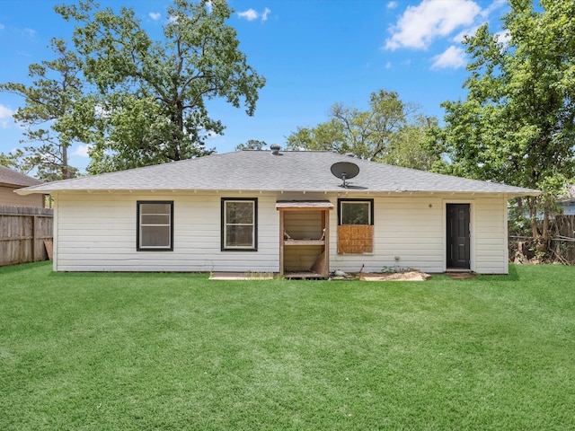8161 Record St, Houston, TX 77028 - back of house featuring a shingled roof
