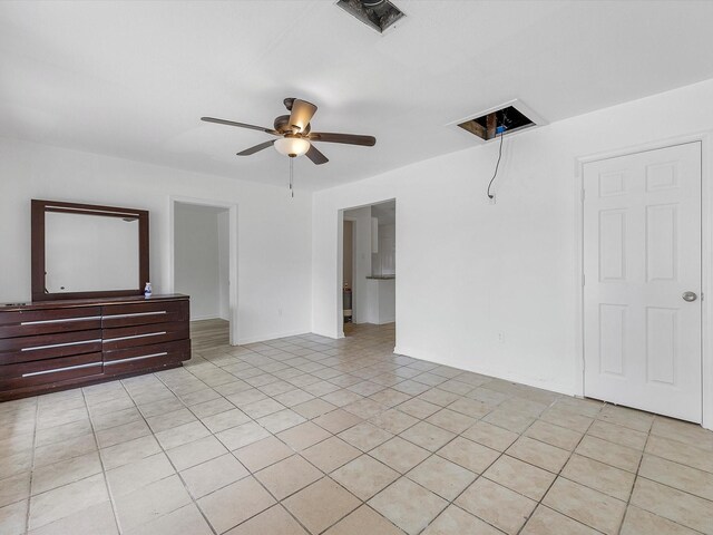 8161 Record St, Houston, TX 77028 - empty room with ceiling fan and light tile patterned floors