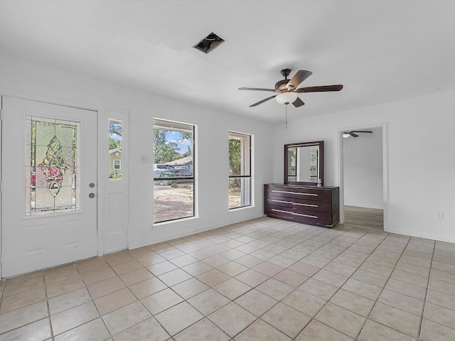 8161 Record St, Houston, TX 77028 - foyer featuring light tile patterned flooring and ceiling fan