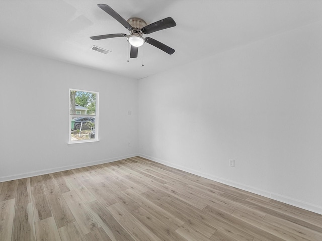 8161 Record St, Houston, TX 77028 - empty room with light wood-style flooring and a ceiling fan