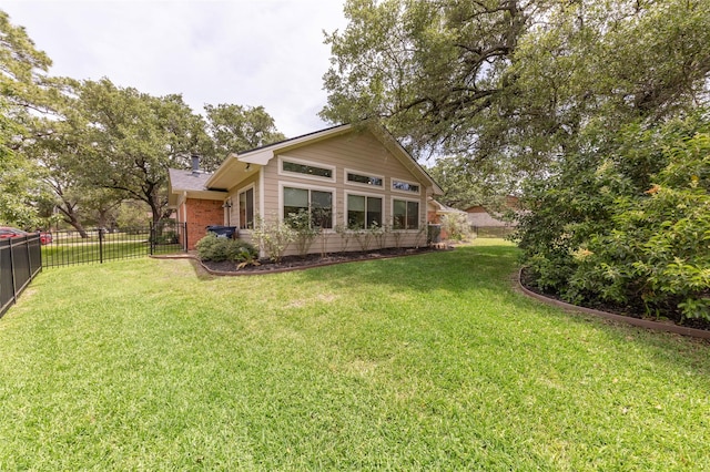1305 Haines Dr, College Station, TX 77840 - rear view of property featuring brick siding