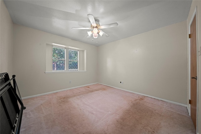 23011 Elephant Walk St, Spring, TX 77389 - unfurnished bedroom with light colored carpet and a ceiling fan