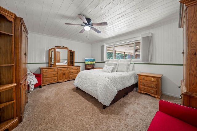 23011 Elephant Walk St, Spring, TX 77389 - carpeted bedroom featuring wood ceiling, ornamental molding, and a ceiling fan