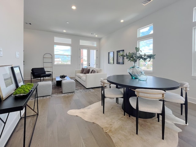 303F Marcella St, Houston, TX 77091 - dining area with light wood-type flooring, recessed lighting, and french doors