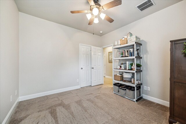6903 Stevenson Dr, Missouri City, TX 77459 - bedroom with carpet floors and ceiling fan