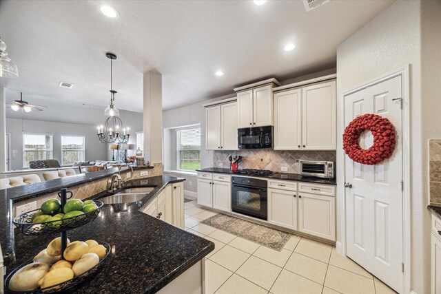 6903 Stevenson Dr, Missouri City, TX 77459 - kitchen featuring black appliances, tasteful backsplash, healthy amount of natural light, light tile patterned floors, and recessed lighting